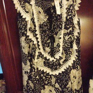 Beautiful silk black and white mini dress from BouBou collection.